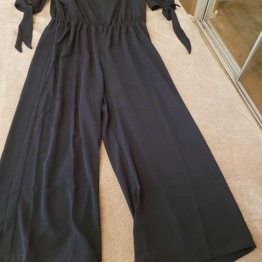 NWT-black jumpsuit w/ tie sleeves